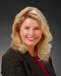 Dr. Debra LaVoi, Superintendent of the Woodland Joint Unified School District, updates the club on district issues.